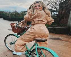 She enjoys riding a bike whenever she finds time.